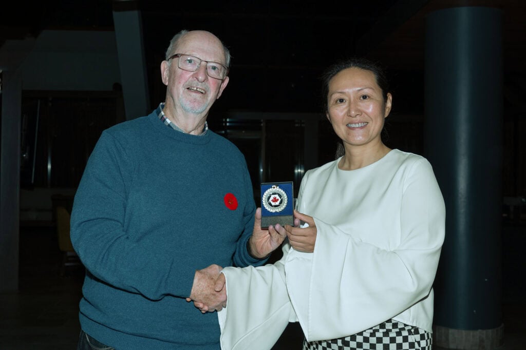 CAPA Toronto Rep Jonathan Ward presenting Ying Shi (Competition Coordinator for Jiahua Elite Photography Association)